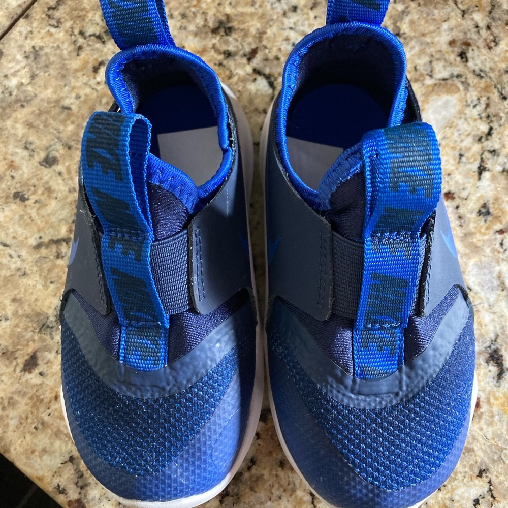 Toddler boys Nike running shoes.